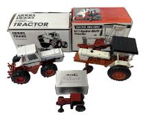 Three die-cast scale model tractors, to include: - Case, 1:35 scale 90 Series 4-Wheel Tractor -
