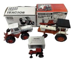 Three die-cast scale model tractors, to include: - Case, 1:35 scale 90 Series 4-Wheel Tractor -