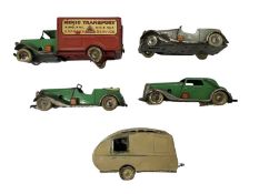 A group of Triang Minic pressed steel vehicles, all playworn.