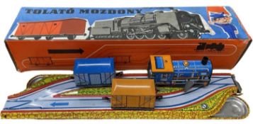 A boxed Hungarian made tinplate clockwork train toy, Tolato Mozdony
