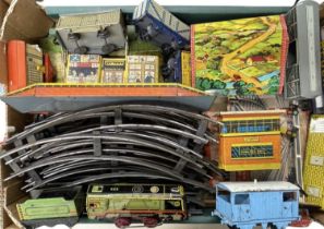 A mixed collection of 0 gauge tinplate rolling stock, predominantely Mettoy