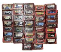 A large collection of Matchbox models of Yesteryear die-cast vehicles (red boxes)