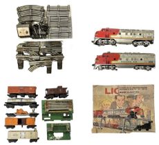 A 1949 Post-War Lionel Lines 0 gauge Santa Fe 2333-20 freight engine, with a good collection of