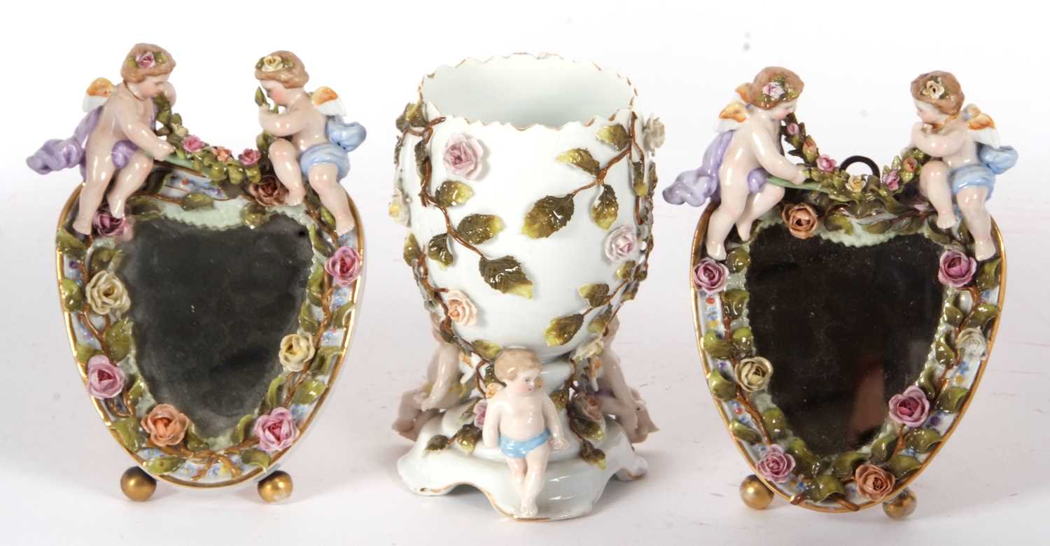 A Continental porcelain vase of oval shaped, supported by three cherubs, the base with Sitzendorf - Image 2 of 5