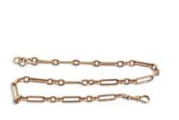 An antique 9ct rose gold watch chain comprising thirteen trombone links joined by sets of three oval