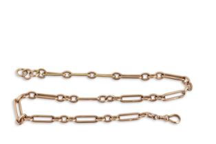 An antique 9ct rose gold watch chain comprising thirteen trombone links joined by sets of three oval