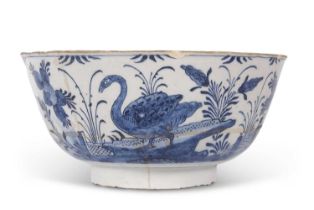An early 18th Century English Delft punch bowl, circa 1730 with blue and white Chinese porcelain