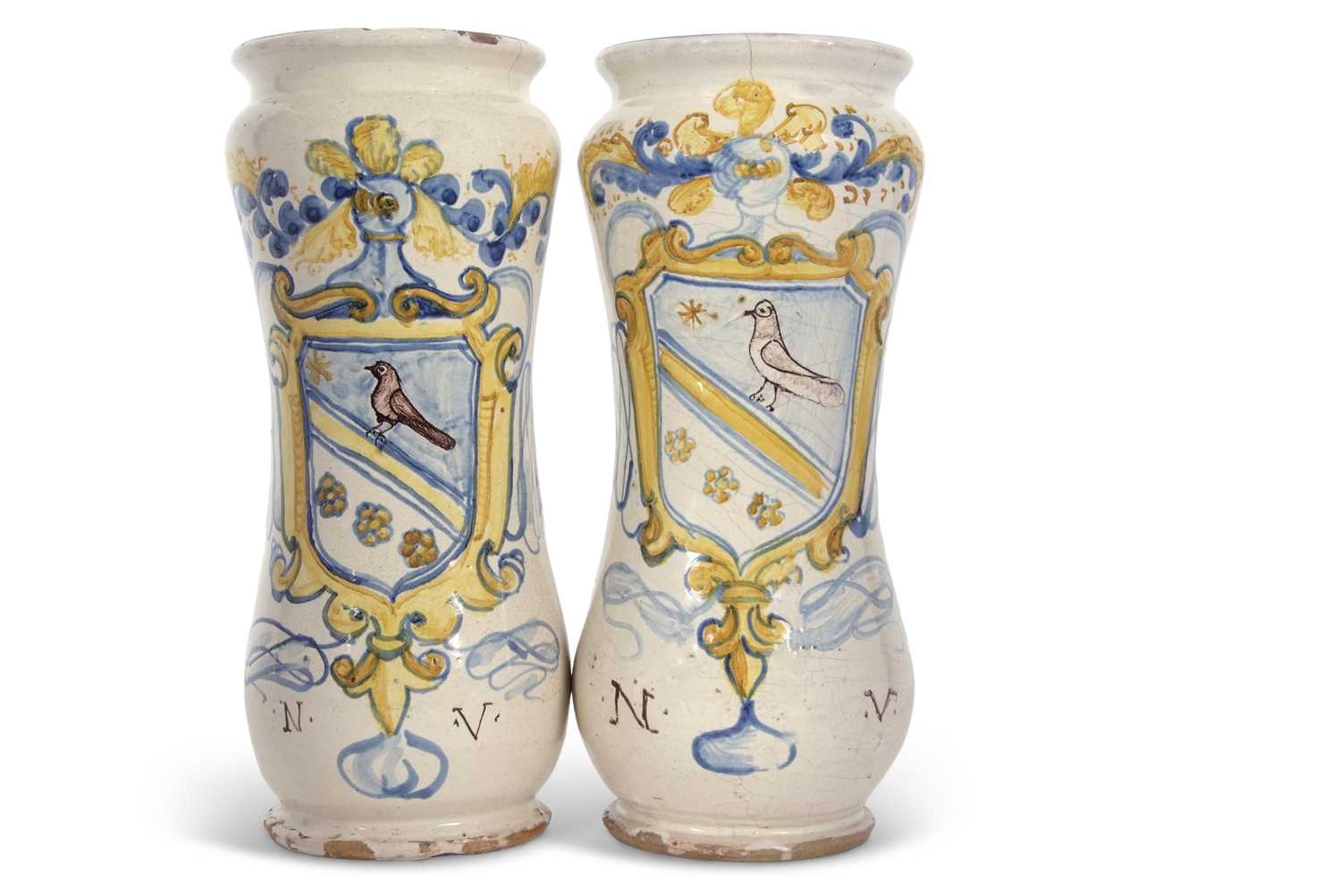 A further large pair of Italian Alberelli also decorated in polychrome with an armorial with the