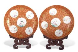 Two 19th Century Chinese porcelain coral ground bowls with gilt scroll decoration, each bowl