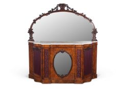 A Victorian mirror back sideboard or credenza with arched mirrored back with foliate frame over a
