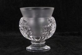 A Lalique frosted and clear glass vase of baluster shape, decorated in relief with leaf shaped