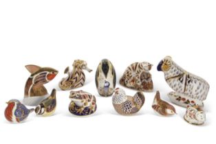 A quantity of Royal Crown Derby paperweights, including Bengal Tiger, a model of a Ram, Penguin,