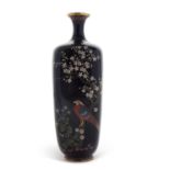 A fine Japanese Cloisonne vase Meiji period, the black ground decorated with a bird amongst blossom,