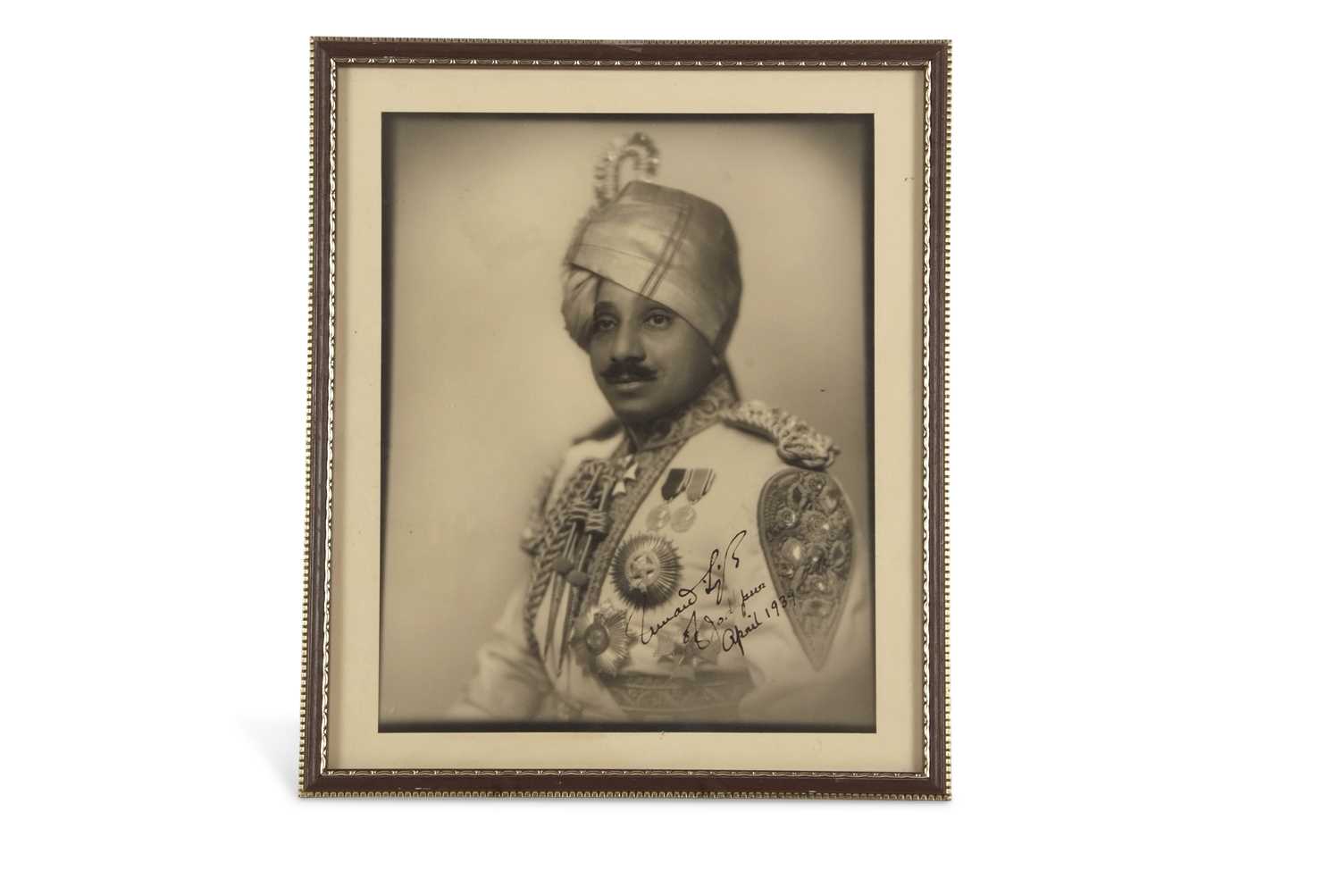 A framed signed photograph of Umaid Singh Maharaja of Jodhpur State between 1918 and 1947, the