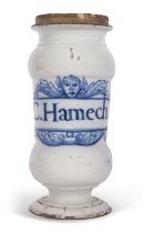 An 18th Century Delft drug jar with central cartouch entitled C.Hamech, 24cm high 2 chips to base (