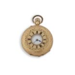 A yellow metal half hunter pocket watch stamped inside the case back 18k, it has a manually crown