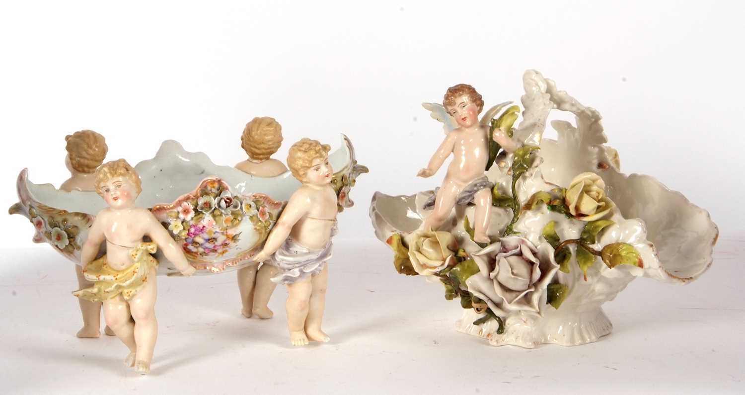 Two continental porcelain baskets one Sitzendorf with applied flowers and cherubs together with a - Image 2 of 11