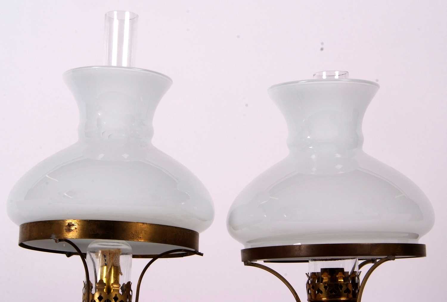 A pair of continental porcelain lamps with white frosted shades, the lamps decorated in the - Image 4 of 8