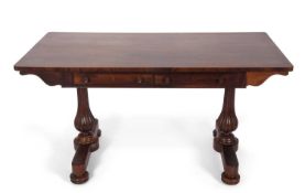 A William IV rosewood centre table with rectangular top with two frieze drawers, raised on