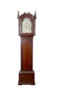 William Morris, Yarmouth a Georgian mahogany long case clock with silvered arch dial with Roman