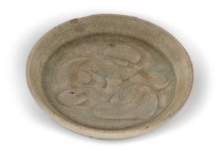 A small Song Dynasty Yue ware dish, the light green ground with a leaf type decoration, 10cm