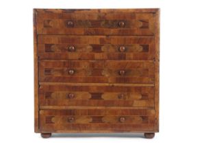 A small walnut and marquetry inlaid table top chest with five small drawers, 39cm wide, 26cm deep
