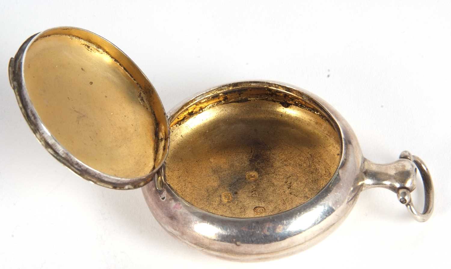 A George III silver snuff box in the form of a pocket watch case of plain circular form, the verso - Image 6 of 7