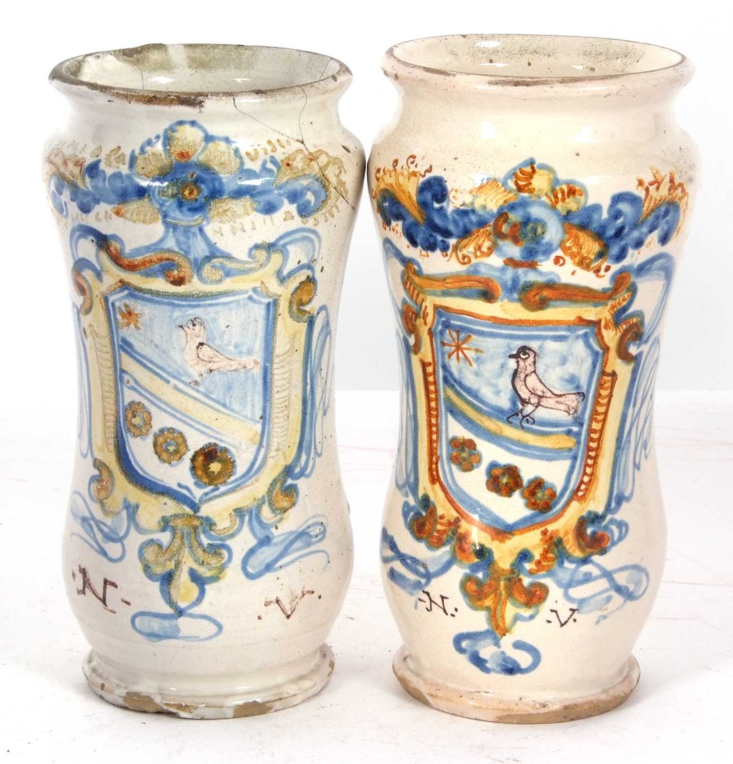 A pair of Italian Faience Alberelli with polychrome designs of an armorial with the initials NV, - Image 2 of 4