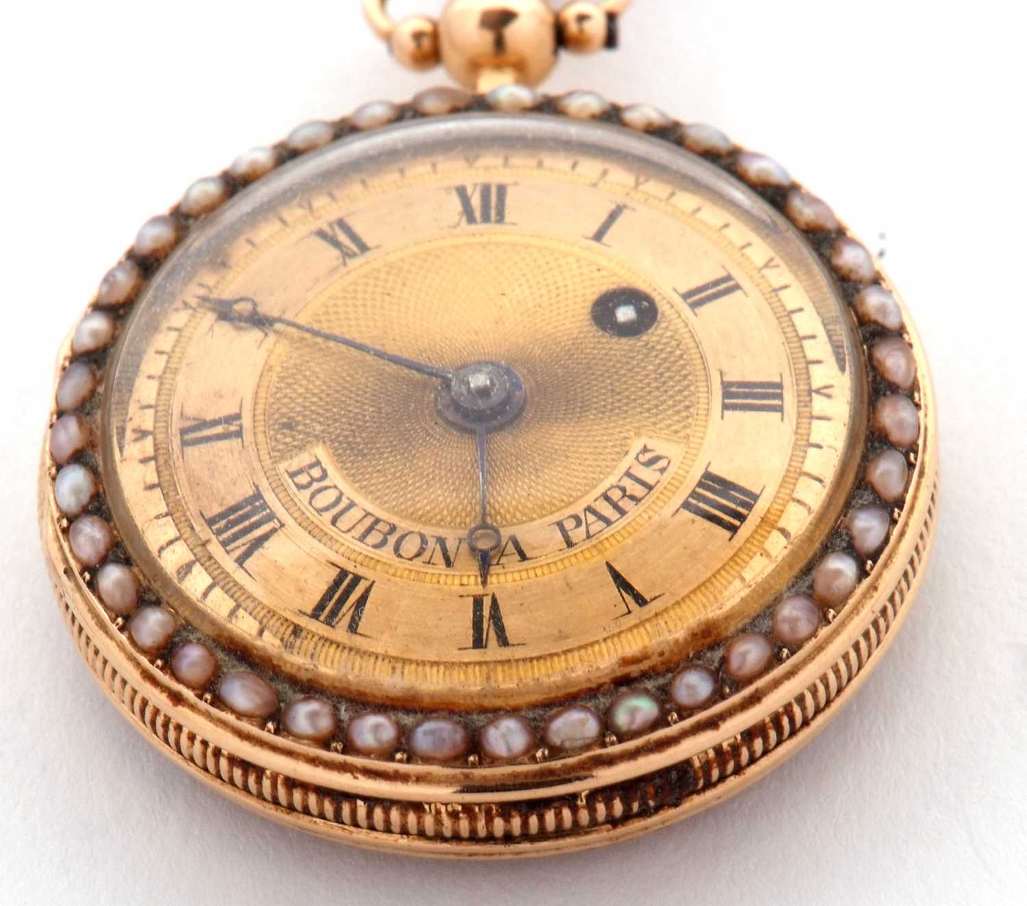 A Boubon a Paris mid grade yellow metal fob watch with chain, the pocket watch has a seed pearl - Image 4 of 9