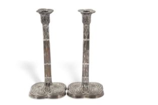 Pair of Art Nouveau silver candlesticks of quatrefoil form having detachable nozels, shaped