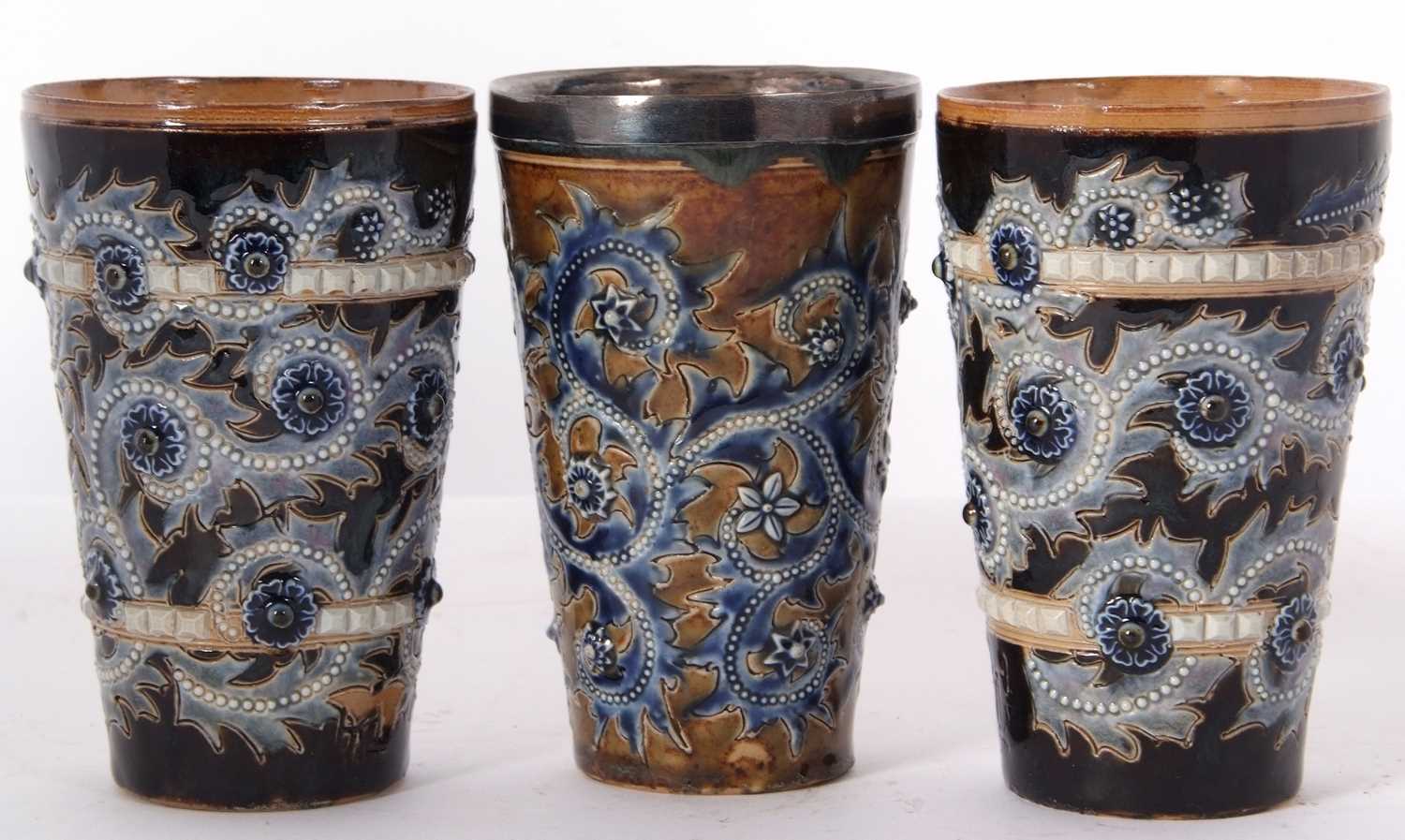 A group of three Doulton Lambeth lemonade beakers all with incised marks for George Tinworth - Image 2 of 5