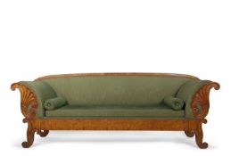 A large Scandinavian Biedermeier style birch sofa with green upholstery and bolster cushions, the