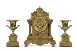 A late 19th Century French green onyx clock garniture by Marti, the clock with architectural case
