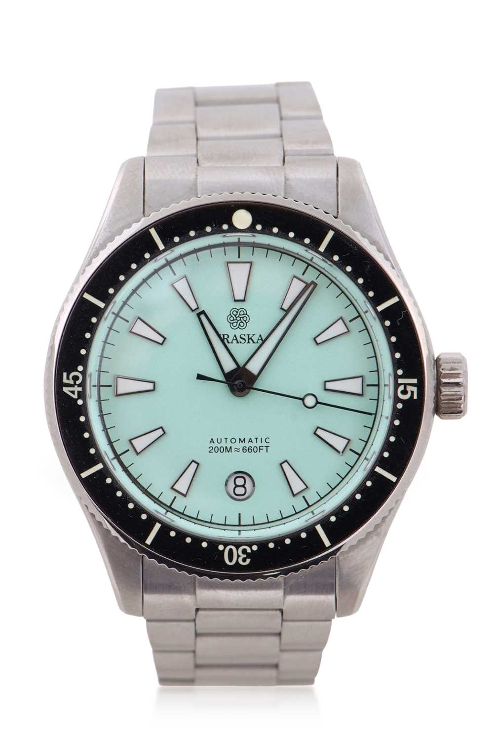 A Traska automatic gents divers wristwatch, the watch has a stainless steel case and bracelet, it