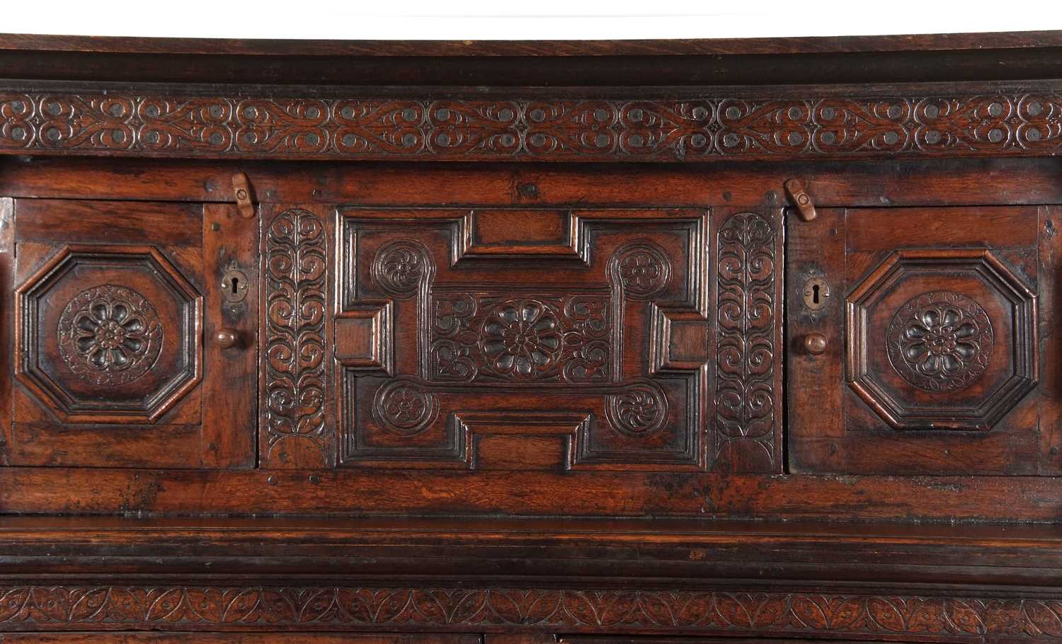 A large 17th Century oak court cupboard with moulded cornice over a top section with two panelled - Image 5 of 8