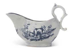 A small English porcelain cream boat, possibly Liverpool, decorated with prints of cows in a