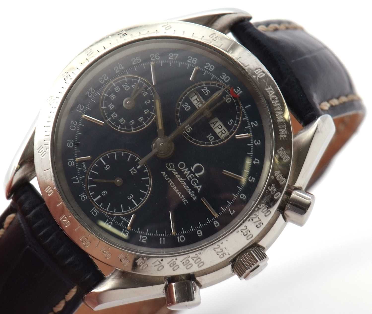 An Omega Speedmaster Triple Date, the watch has an automatic movement, blue dial with a day/month - Image 7 of 8
