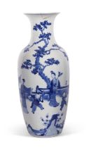 A large Chinese porcelain vase finely painted with Chinese figures amongst bamboo and rock work,