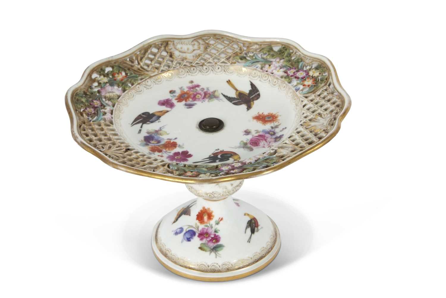 A Meissen tazza, the centre painted with birds and flowers within reticulated borders and with