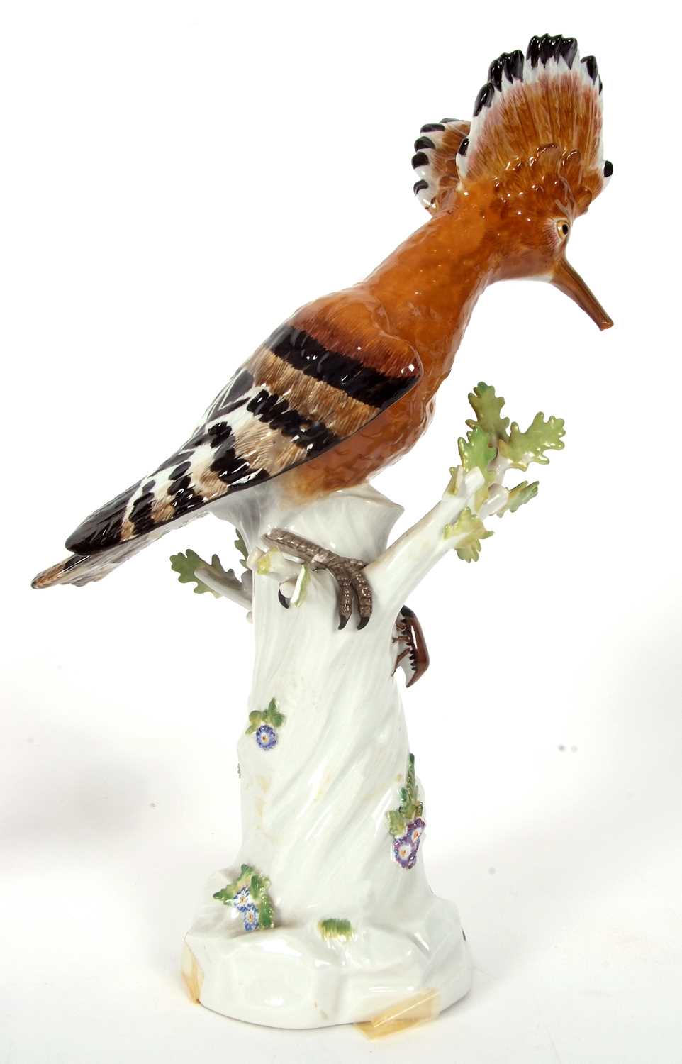 A Meissen model of a Hoopoe bird on a tree trunk, the trunk decorated with insects and flowers, blue - Image 2 of 6