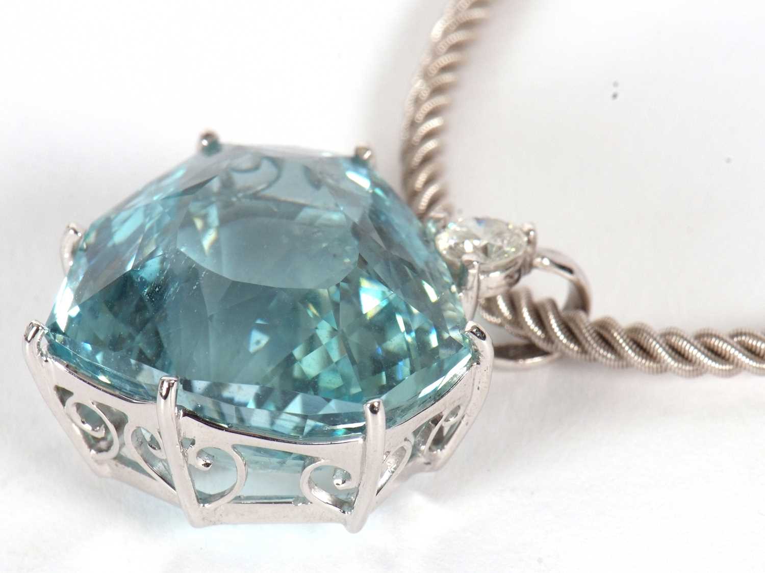 An aquamarine and diamond necklace, the heart shaped mixed cut aquamarine, approx. 37cts, claw - Image 9 of 10