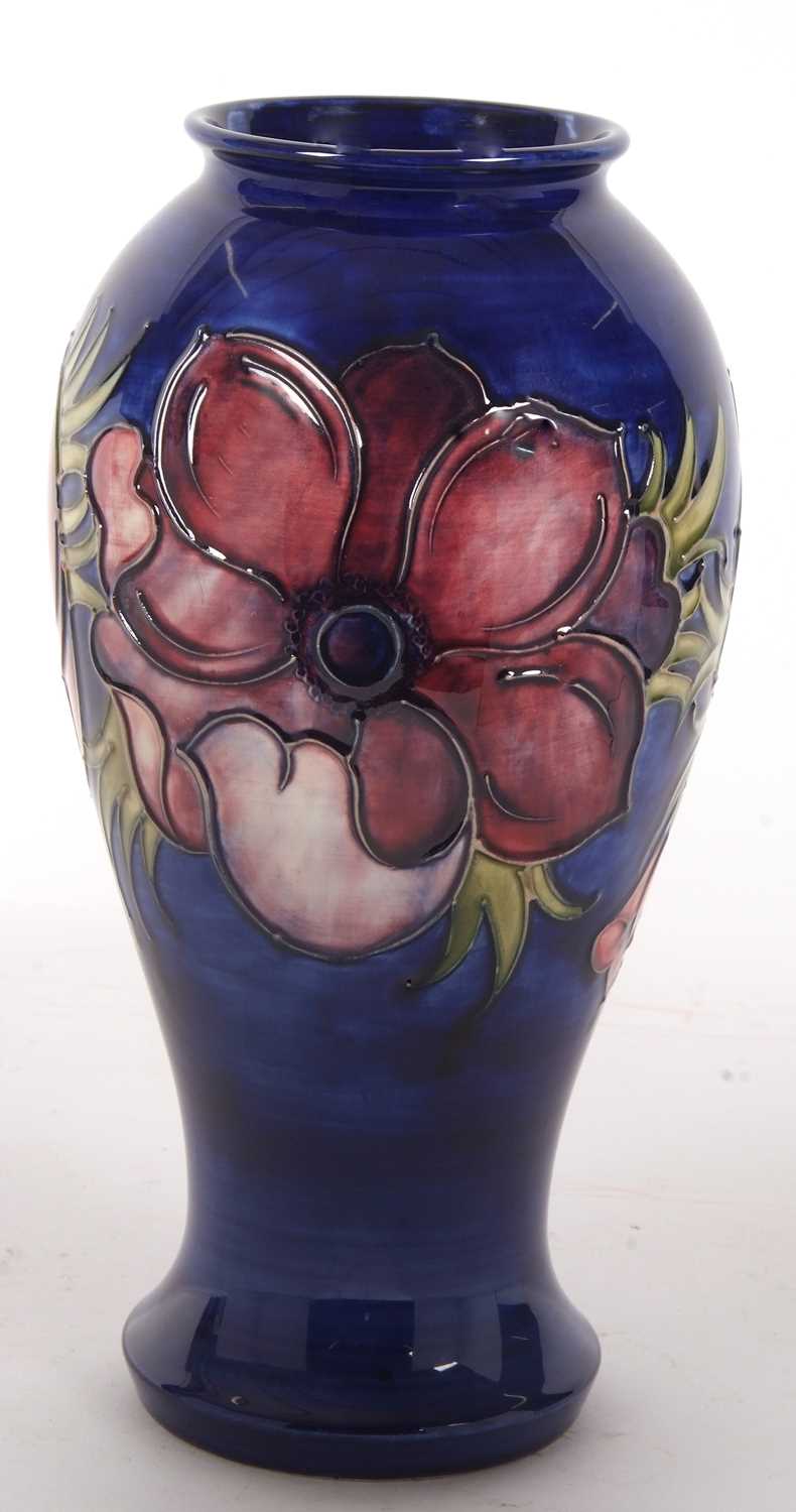 A large Moorcroft vase the blue ground decorated with tubelined anemone pattern with green signature - Image 3 of 5