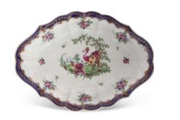 A further 18th Century Worcester dish painted with exotic birds surrounded by painted fruit within a