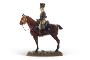 An impressive Dresden porcelain model of Cavalry soldier on horseback, the base marked in blue, 12th