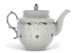 An unusual Lowestoft teapot and matching cover and clip handle c.1790 of fluted form with feather