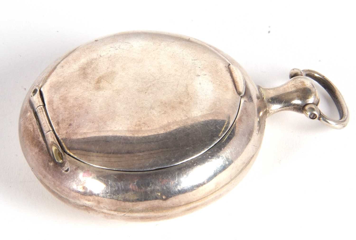 A George III silver snuff box in the form of a pocket watch case of plain circular form, the verso - Image 4 of 7