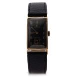 A 9ct gold cased Omega Tank gents wristwatch, it has a manually crown wound movement, the inside