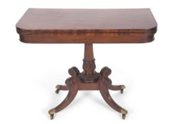 Late Regency mahogany, pedestal fold-top card table on four fluted sabre legs, brass caps and
