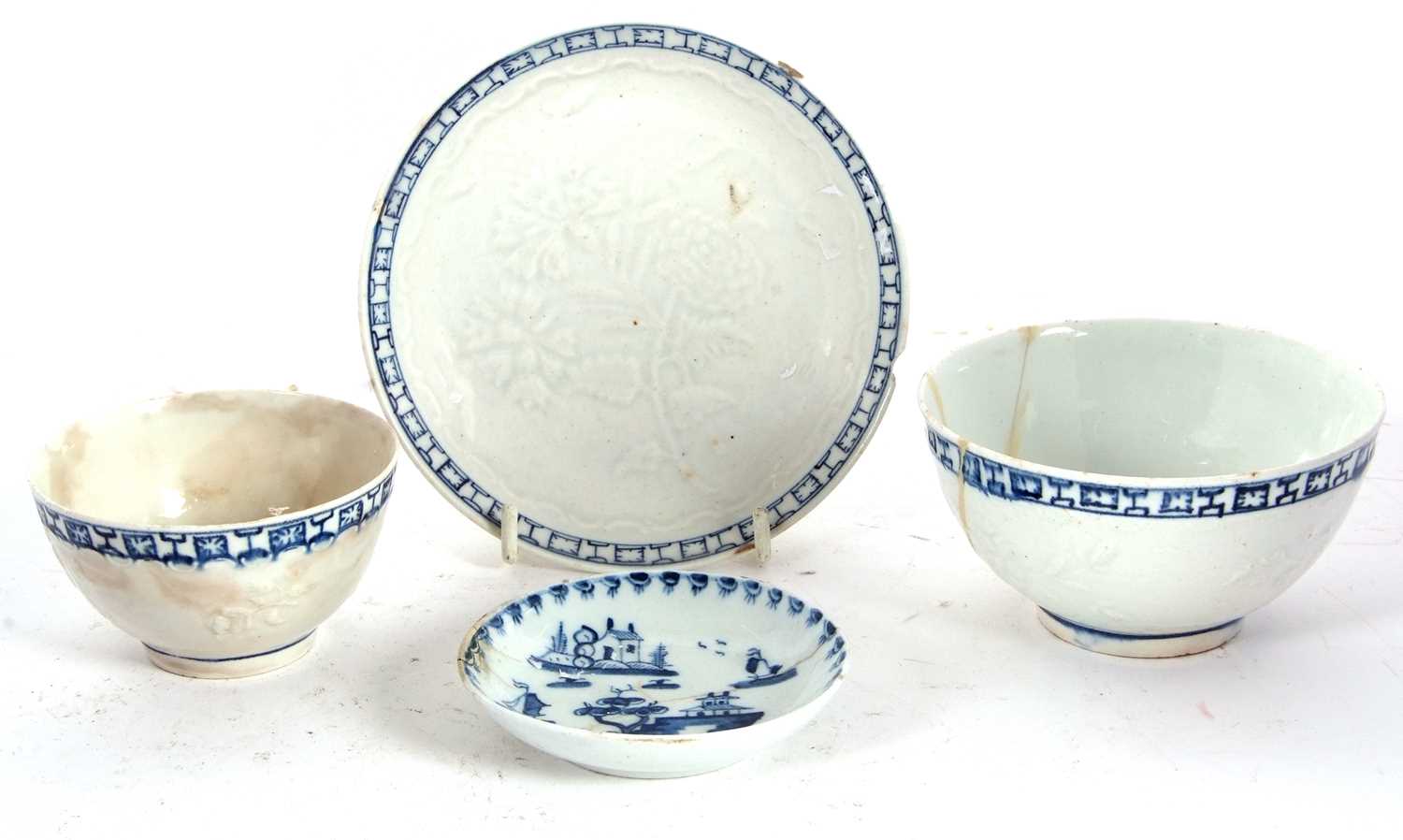 An early Lowestoft porcelain tea bowl and saucer with a moulded carnation design together with a - Image 2 of 4