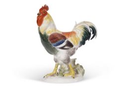 A 20th Century Meissen model of a cockerel, 18cm high, blue cross swords mark to base and